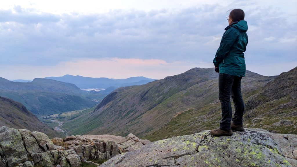 Mia near Sprinkling Tarn, looking out over the Lake District